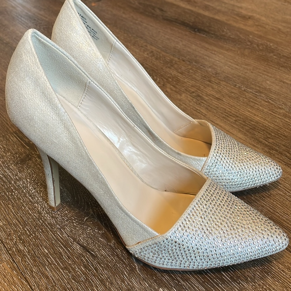 APT 9 heels. Only worn a few times but do show signs of wear. Please review pics